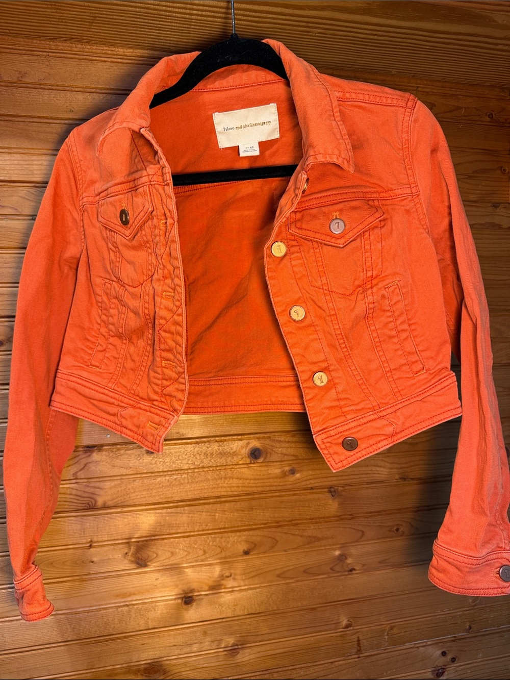 Anthro Pilcro and the Letterpress Coral-Orange Cropped Denim Jacket
